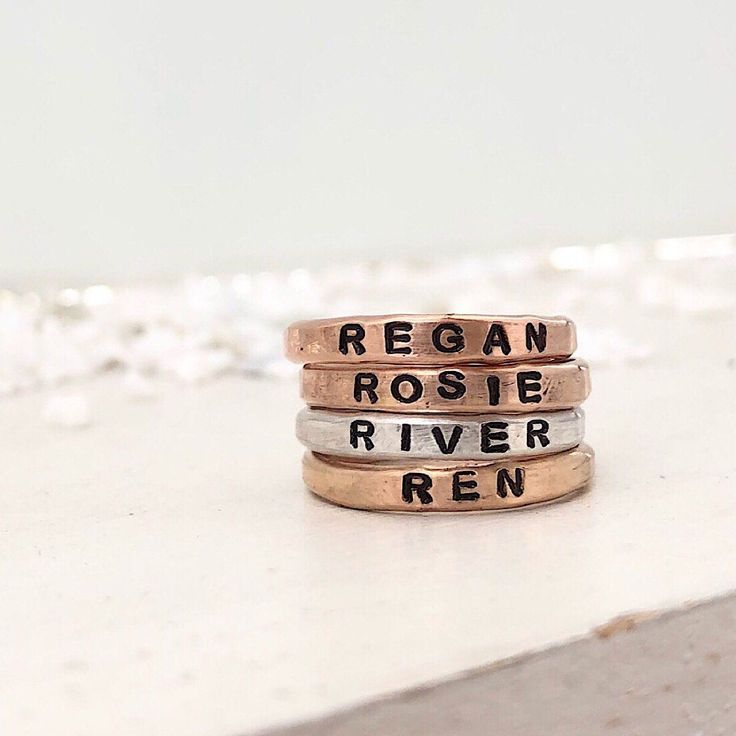 We are so excited to add our Little Id Personalized Stacking Rings to our ring collection. Perfect for stacking just like our original name ring but a little more delicate and feminine. Featuring an upper case letter font, you can comfortably stack up to 5 of these rings. Created to mix and match perfectly with the rest of our collection so you can create a ring stack that's just right for you. Keep your loves close, commemorate a special date or a short meaningful message, use symbols, it's tot