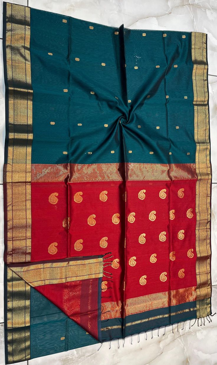 *It's a beautiful  Maheshwari Handwoven paisli Buta Saree. *100% Handloom : comes with India Handloom Mark *Washing Method : Dry Clean Recommended *Weave Type: Maheshwari *Material: Half Silk & Half Cotton *Length: Saree: 5.5 metres *Blouse Piece: 0.80 metres *Width : 46 Inches* Please note - color may be vary a little due to sunlight and photography . Please message us after purchasing in case you want fall and Pico done it not . No extra charges for fall and Pico but inform us . Blouse stitching is also available . Festival Art Silk Handloom Pre-draped Saree, Chanderi Anarkali Traditional Wear For Rituals, Anarkali Chanderi Traditional Wear For Rituals, Festive Cotton Silk Dupatta For Rituals, Festive Cotton Silk Traditional Wear For Rituals, Celebration Handloom Chanderi Pre-draped Saree, Cotton Silk Traditional Wear For Navratri Rituals, Bollywood Style Cotton Silk Dupatta For Rituals, Pre-draped Cutdana Saree For Rituals