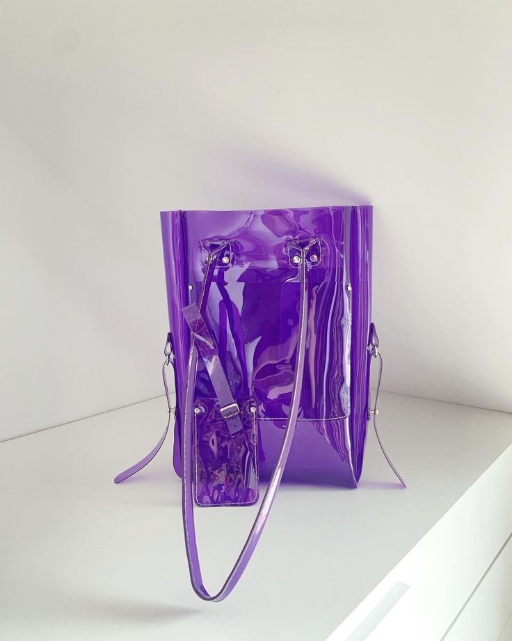 Purple tote bag, shoulder bag, vinyl bag, security handbags, jelly purse, office style, vegan, 90s, y2k, handmade tote, medium bag, custom Made for order in 7 days. Dimensions: 28 x 33 x 6 ( 8 cm top11 x 13 x 2,36 ( 3,15 top) Two pockets inside and one outside. Made of thick, crystalline, flexible PVC, 100 % in my workshop. See my other unusual handbags, which I create with passion and love for things exceptional nature, as these inspire real life . https://www.etsy.com/shop/ypsilonbags ...pleas Trendy Top Handle Shoulder Bag With Clear Strap, Trendy Purple Satchel For Everyday Use, Trendy Square Plastic Bags, Trendy Purple Everyday Satchel, Trendy Plastic Satchel Bag, Daily Use Top Handle Shoulder Bag With Clear Strap, Clear Strap Shoulder Bag Satchel For Shopping, Clear Top Handle Shoulder Bag For Everyday Use, Modern Satchel Bag With Clear Strap