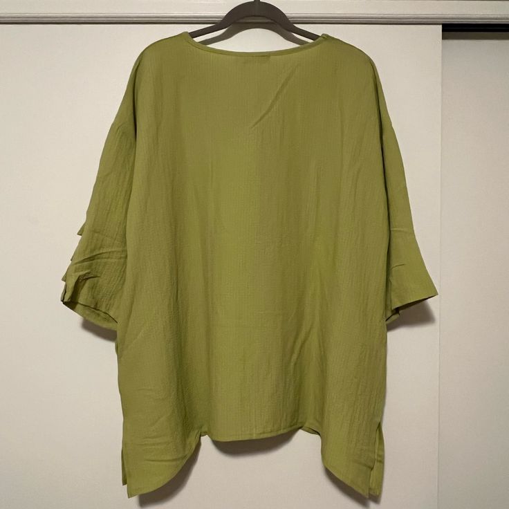 Beautiful Crepey Lime Green Blouse. Green Relaxed Fit V-neck Blouse, Oversized Green V-neck Top, Oversized Green Cotton Blouse, Spring Green Lagenlook Tops, Oversized Green Tunic For Spring, Solid Color Summer Tunic Top, Cotton Lagenlook Tops For Daywear, Oversized Tunic Top For Vacation, Relaxed Fit Green Blouse For Vacation