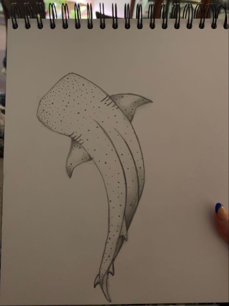 a drawing of a banana with dots on it