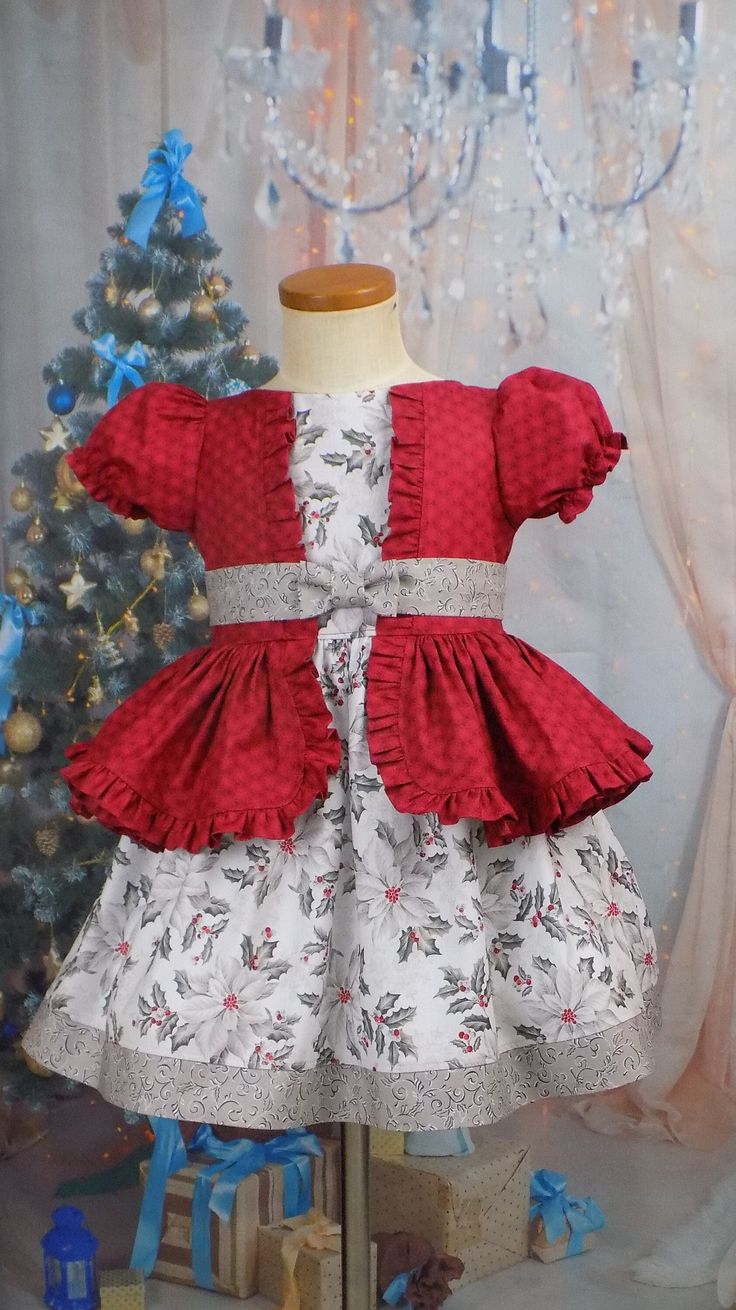 Burgundy and Silver Holiday Dress with a Bolero Look Once Piece Dress with Short Sleeves and Waist Ruffle Perfect for Christmas day or a visit to Santa, Pictures and Christmas Cards Can be used as a Christmas Pageant Dress or Outfit of Choice, OOC Fabric is 100 % Cotton Optional premade Tutu Available for fullness like mannequin has This style dress can be made in the fabric of your choice-message me Handmade Made in the USA by me! All of my Unique items are Sewn in a Clean Smoke Free environmen Ooc Pageant Wear, Christmas Pageant Dress, Pageant Ooc, Fancy Boutique, Girls Western Dresses, Serger Machine, Once Piece, Pageant Wear, Christmas Pageant