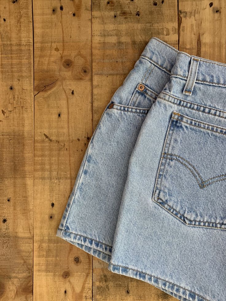 "High waisted 90's denim shorts. Made by Levi's in light blue denim wash. Shorts are in great clean condition. Perfectly worn in with light naturally distressed character. Measurements are taken zipped or buttoned up and laid comfortably flat then x 2 for total circumference (inches) Tag Size 12 Levis 941 100% Cotton Waist 33\" Hips 43\" Length 14\" Inseam 3.5\" Rise 11\" leg opening circumference 25.5\" All items are free of rips, tears, holes, and stains unless otherwise noted." Retro Straight Leg Shorts With Pockets, Vintage Jeans With Built-in Shorts For Spring, 90s Inspired Denim Jean Shorts For Spring, Retro Straight Leg Jean Shorts With Pockets, 90s Inspired Denim Shorts, Vintage Denim Shorts In Medium Wash, Light Wash Jean Shorts With Pockets, Vintage Medium Wash Denim Shorts, 90s Inspired High Rise Denim Shorts