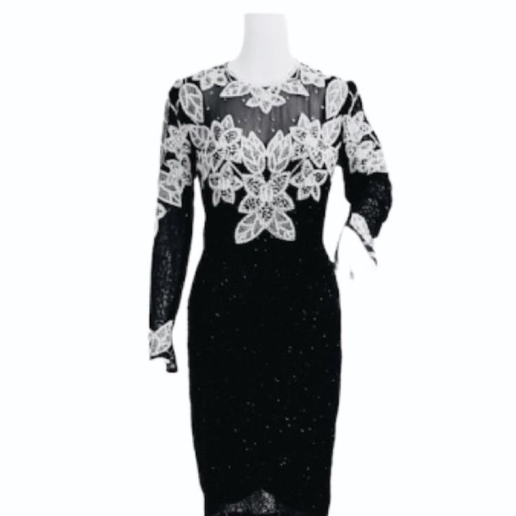 Black Tie 100% Silk Dress With Long Sleeves And Bead Embellishment Throughout, Hook-And-Eye Closures And Back Keyhole Opening And Invisible Back Zip Closure. Condition: Excellent Festive Formal Evening Dress With Contrast Sequin, Formal Evening Dress With Contrast Sequin For Festive Occasions, Elegant Evening Embellished Sequin Dress, Elegant Black Sequin Dress For Wedding, Black Sparkling Dress For Wedding, Black Sparkling Wedding Dress, Elegant Sequin Dress For Formal Festive Events, Elegant Fitted Evening Dress With Contrast Sequin, Elegant Evening Dress With Contrast Sequin