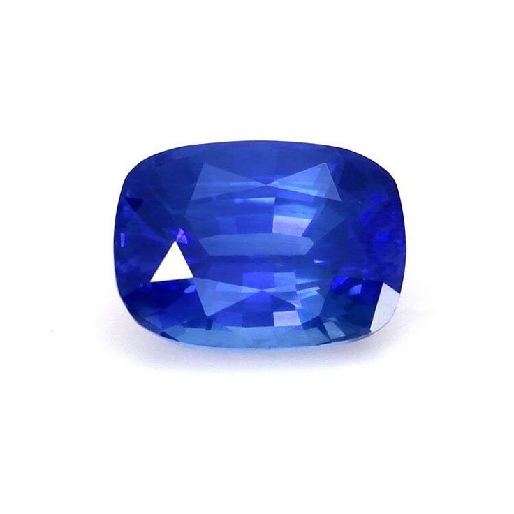 a blue sapphire stone on a white background