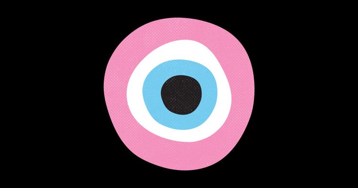 an eyeball is shown in the middle of a pink circle with black dots on it