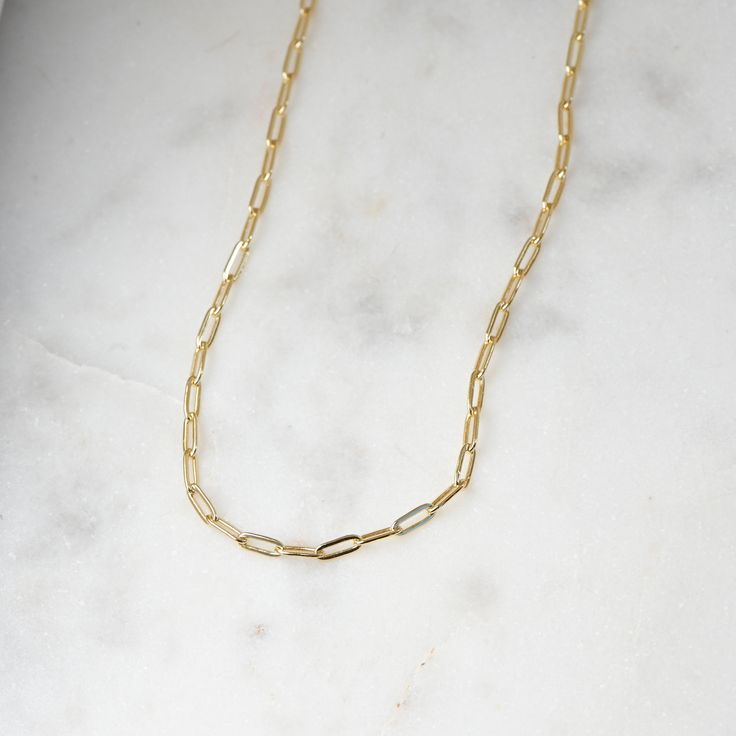 "Tiny links paperclip necklace! Our tiniest link paperclip chain available. Very sweet and dainty, and adds that perfect trendy touch while still being minimalist and chic! We have 4 different Paperclip styles available. See below for listings! ❖ DETAILS ❖ ➤ 14k Gold, Rhodium, or Rose Gold plated 925 Sterling Silver ➤ Made of THICK plating over sterling silver for a piece that will be with you for years to come! ➤ 16\" Chain + 2.5\" Extension chain ➤ Lobster Clasp Closure ➤ Nickel-free and hypoa Minimalist Gold Charm Necklaces With Paperclip Chain, Minimalist Gold Charm Necklace With Paperclip Chain, Dainty Paperclip Chain Necklace For Gift, Minimalist Link Chain Necklace For Everyday, Everyday Link Chain Necklace With Paperclip Chain, Minimalist Everyday Link Chain Necklace, Minimalist Paperclip Chain Necklace As Gift, Minimalist Paperclip Chain Necklace For Gift, Everyday Oval Link Charm Necklaces With Paperclip Chain