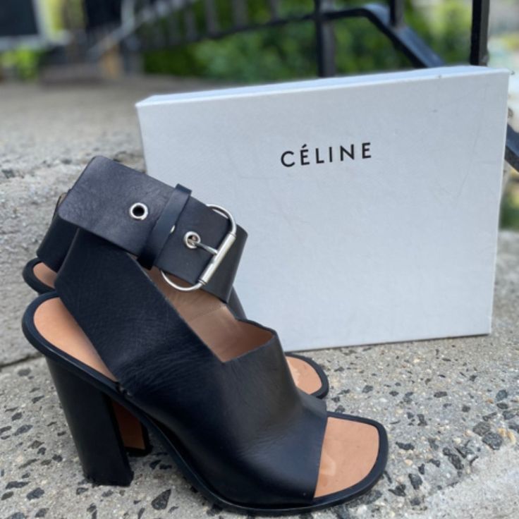 Celine Peep Toe Sandal Size 40.5 Shoe Excellent Pre Loved Condition (Marks At Insole Near Front Toe Opening) Square Heel Peep Toe Sandal Ankle Buckle Silver Tone Hardware In Box Modern Calf Leather Heels With Buckle Closure, Open Toe Heels With Buckle Closure In Calf Leather, Designer Heels With Ankle Strap And Buckle Closure, Chic Sandals With Heel Loop And Block Heel, Luxury Black Mules With Wrapped Heel, Calf Leather Heels With Buckle Closure, Designer Mules With Buckle Closure And Open Heel, Luxury Block Heel Mules With Heel Loop, Luxury Mules With Heel Loop And Block Heel