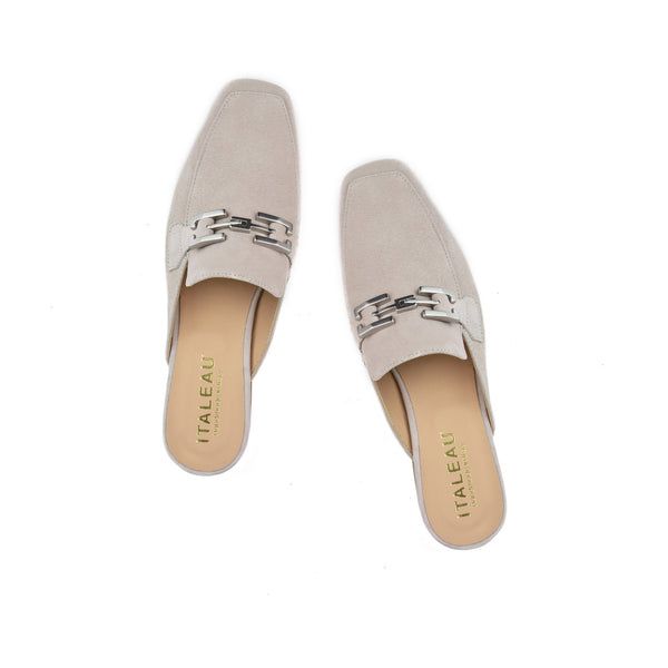 Cecile Mules | Women’s Mules | Italian Suede Shoes - Italeau Chic Flat Slip-ons For Office, Formal Beige Slip-ons For Spring, Spring Business Casual Flat Slip-ons, Formal Slip-ons With Flat Heel For Summer, Formal Summer Slip-ons With Flat Heel, Summer Workwear Flat Slip-ons, Formal Summer Slip-ons, Trendy Suede Slip-on Sandals, Chic Beige Almond Toe Slip-ons