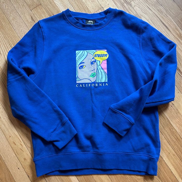 Bright Blue Pop Art Stussy Crewneck Sweatshirt, Never Worn! Blue Graphic Print Sweater For Streetwear, Blue Trendy Relaxed Fit Sweatshirt, Trendy Blue Graphic Print Sweatshirt, Trendy Blue Sweatshirt With Graphic Print, Blue Cotton Sweater With Graphic Print, Blue Screen Print Sweatshirt For Streetwear, Blue Casual Sweatshirt With Screen Print, Casual Blue Sweatshirt With Screen Print, Blue Long Sleeve Sweatshirt With Graphic Print