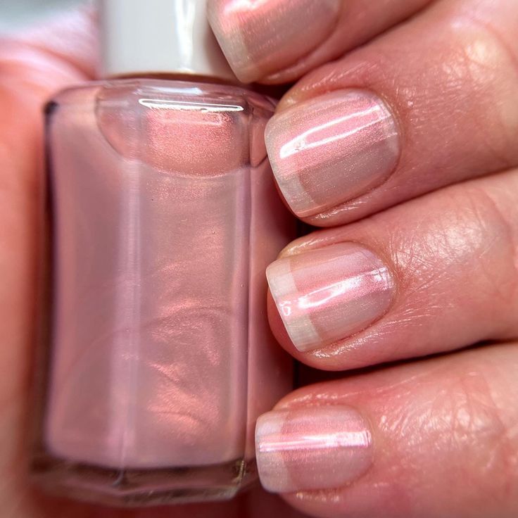 Cherry Blossom (#24) - a beautiful soft pink with a shimmer and glossy finish.  Bottle size: 13.5ml / 0.46oz SparrowScribbles (S.S.) nail polish is cruelty free, vegan friendly, 10-free, and our pigments are always ethically sourced.  What is 10-free? 10-free nail polish is a nail polish that is free from ten harmful chemicals commonly found in traditional nail polishes. These include formaldehyde, formaldehyde resin, toluene, dibutyl phthalate (DBP), camphor, xylene, ethyl tosylamide, triphenyl Sheer Nail Polish, Cherry Blossom Nails, Sheer Nails, Toxin Free, Bottle Sizes, Making 10, Nail Technician, Nail Polishes, Harmful Chemicals