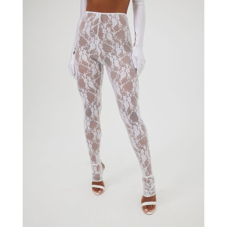 Price listed in USD. White lace unlined leggings with heel and toe opening. (To complete this look the skirt matching top and scarf are available for purchase.) Sizing: XS, S, M, L Sizing: XS: Bust: 30”-32” Waist: 23”-24”,Hips: 33”-35” S: Bust: 33”-34” Waist: 25”-26” Hips: 36”-37” M: Bust: 35”-36” Waist: 27”-28” Hips:38”-39” L: Bust : 37"-38" Waist: 29"-31" Hips: 40"-41" XL: Bust 39”-40” Waist : 32”-33” Hips: 42”-43” Petit : 5’1” to 5’3’’ Regular : 5’4” to 5’7” Tall: 5’8” to 5’10” Fabric content Sheer Lace Bottoms For Evening, Spring Evening Lace Bottoms, Party Bottoms With Lace Trim And Stretch, Party Bottoms With Lace Trim Long Pants, Elegant Lace Party Bottoms, Elegant Fitted Bottoms With Lace Trim, Elegant Lace Pants For Night Out, Evening Pants With Lace Trim, Sheer High Stretch Party Bottoms