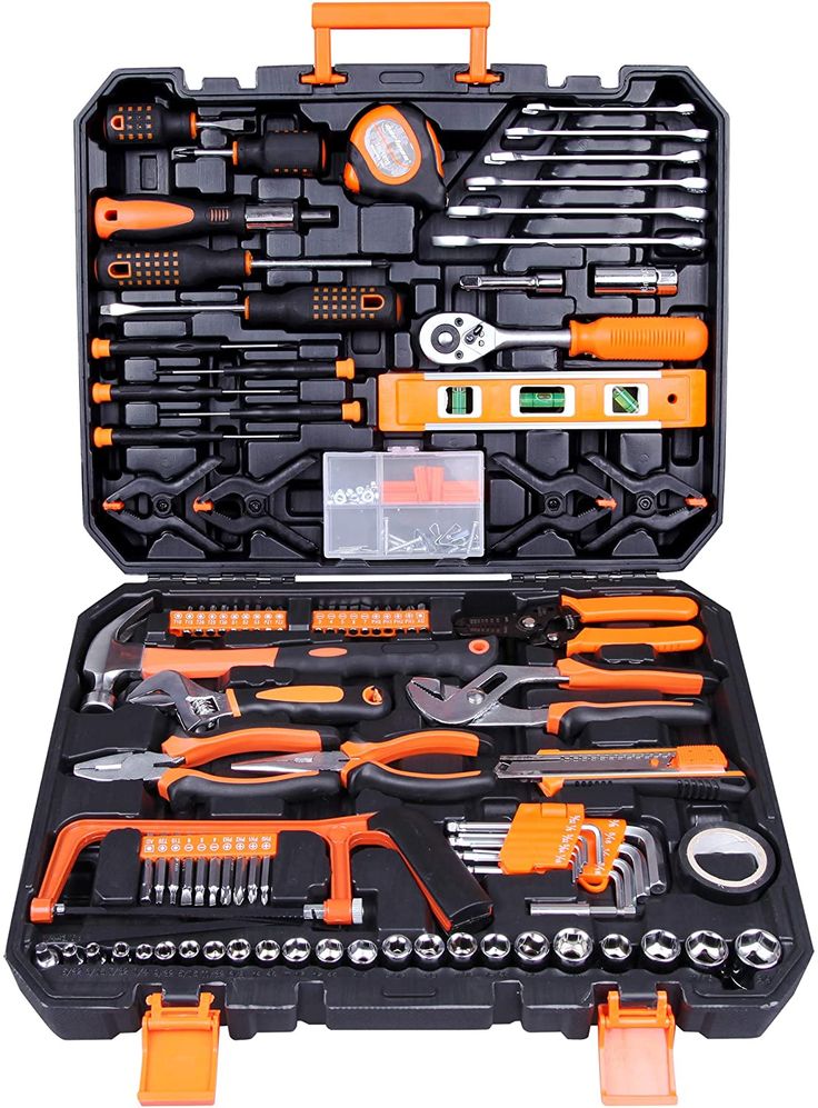 an open tool box filled with tools on top of a white surface and orange handles