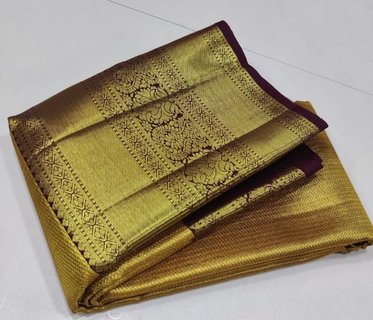 1.this is beautiful  pure kanjivaram silk sari with one gram gold zari weaving bridal collection with running blouse piece 2:this sari is 5.5 mt length  3.this is a very elegant looking sari for all occasions like weddings and other formal events  4.fall n pico is complimentary5.blouse can be made as per the requirements of the clients with proper measurements.stiching charges will be extra  6.plz check the availability of the sari before placing the order Ceremonial Gold Tussar Silk Traditional Wear, Gold Tussar Silk Saree With Zari Weaving, Ceremonial Gold Tussar Silk Dupatta, Gold Tussar Silk Saree Silk Mark Certified, Gold Silk Mark Certified Dupatta In Traditional Drape, Gold Dupatta, Silk Mark Certified, Traditional Drape, Gold Dupatta With Silk Mark Certification And Traditional Drape, Gold Raw Silk Dupatta With Silk Mark, Traditional Gold Dupatta Silk Mark Certified