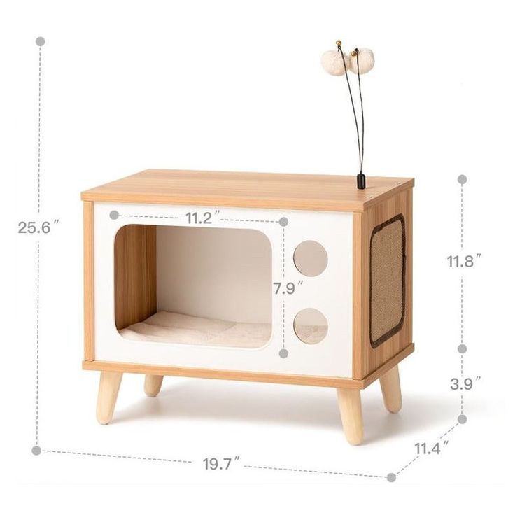 a white and brown microwave oven sitting on top of a wooden table