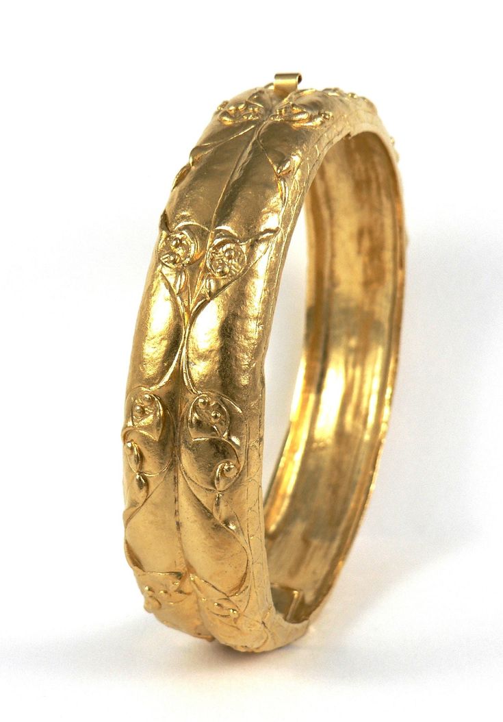 "Stunning Gold plated Celtic Bangle bracelet. This is an exact replica of the 70 BC bracelet from the Snettisham Hoard of treasure found in 1950. Part of the range available at historicjewelleryreproduction.co.uk  Historic Jewellery Reproduction is unique in that we were the first and only jewellery company in the world allowed to mould the original Museum exhibits, therefore EVERY detail is exactly the same as the Museum original. Be Authentic! Wear a piece of History ! HJR was established in 1969 by Peter Shorer FIIC and was the first jewellery company in the world creating replicas moulded directly from the original pieces. This was due to the pioneering archaeological techniques he perfected over 40 years at the British Museum. As a seventh generation Goldsmith I am continuing his pass Antique Hallmarked Gold Bracelet For Ceremonial Occasions, Medieval Engraved Jewelry For Weddings, Medieval Style Engraved Wedding Jewelry, Medieval Engraved Wedding Jewelry, Antique Gold Bangle Bracelet For Ceremonial Occasions, Antique Gold Bangle Bracelet For Ceremonies, Medieval Engraved Jewelry For Anniversary, Brass Byzantine Jewelry For Ceremonial Occasions, Ornate Hallmarked Gold Bracelet For Ceremonial Occasions