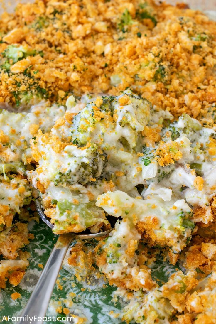 a casserole dish with broccoli and cheese