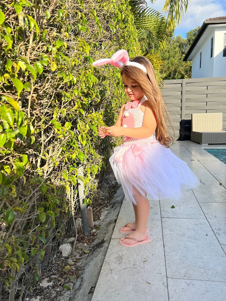 This is the cutest little Easter bunny you have ever seen. This dress comes with a pair of bunny ears, bow tie and bunny tail. It looks absolutely adorable on! Whimsical Tutu Dress For Easter Dress-up, White Tutu Dress For Easter, Sleeveless Spring Tutu Dress For Costume Party, Playful Easter Dress-up Dresses, Cute Tutu Dress For Easter Dress-up, Cute Easter Dress-up Dresses, Playful Tutu Dress For Spring Costume Party, Playful Spring Tutu Dress For Costume Party, White Tutu Dress For Easter Party