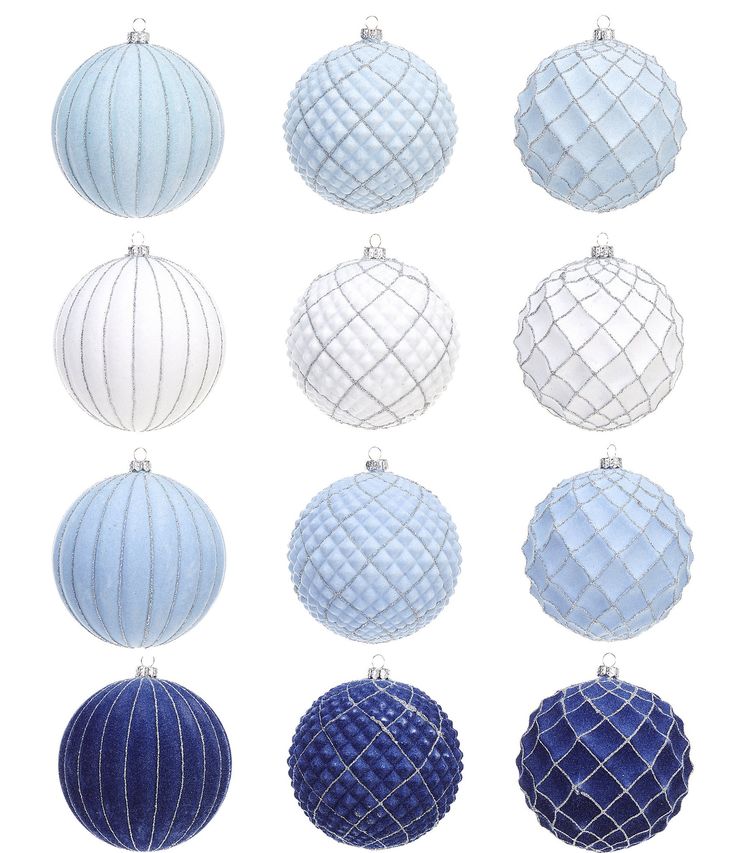 twelve blue and white christmas ornaments hanging from strings