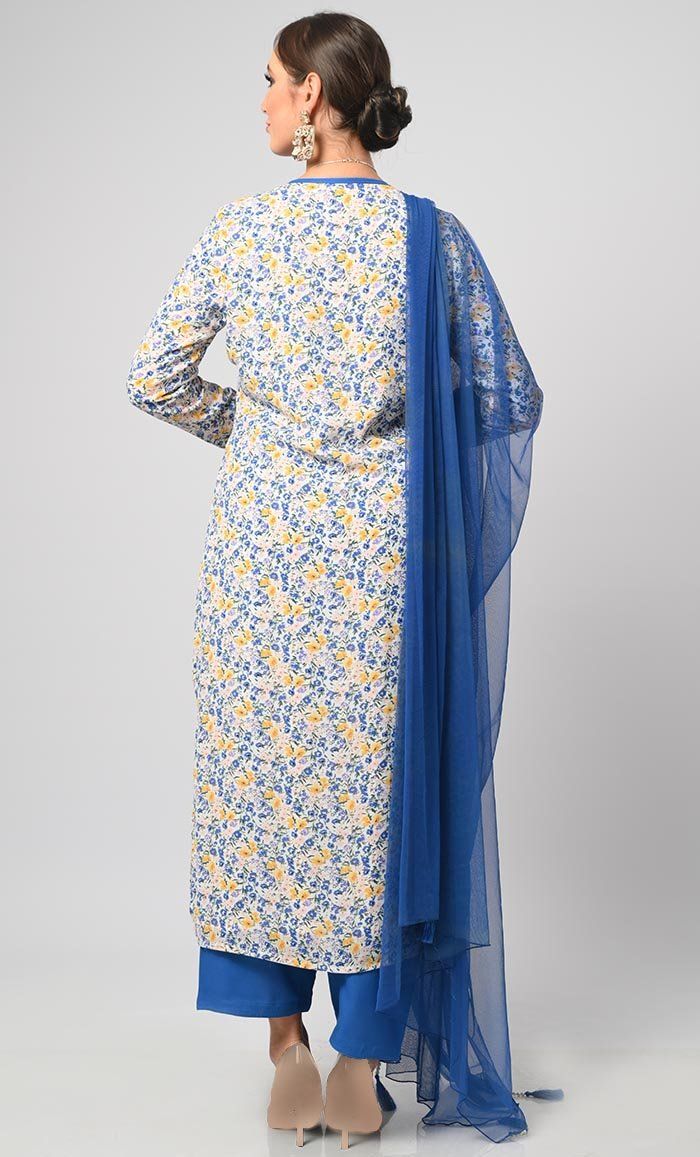 African floral printed salwar set suits. It is a detailed and intricate form of front tassels that involves the use of small, colorful stitches to create patterns and designs on the fabric of the garment. It is a popular choice for special occasions, such as weddings and festivals. Plazzo suits are a variation of the traditional salwar kameez. Plazzo suits are a more modern and casual alternative to the traditional salwar kameez and are often worn with a shorter, tunic-style kameez. Fabric Detai Cotton Lawn Suit With Printed Border, Patterned Cotton Lawn Suit With Printed Border, Bollywood Style Cotton Lawn Suit With Printed Border, Patterned Unstitched Suit With Printed Motifs, Eid Long Sleeve Digital Print Palazzo Set, Fitted Patterned Lawn Suit With Long Sleeves, Patterned Fitted Long Sleeve Lawn Suit, Fitted Long Sleeve Patterned Lawn Suit, Multicolor Cotton Unstitched Suit With Long Sleeves