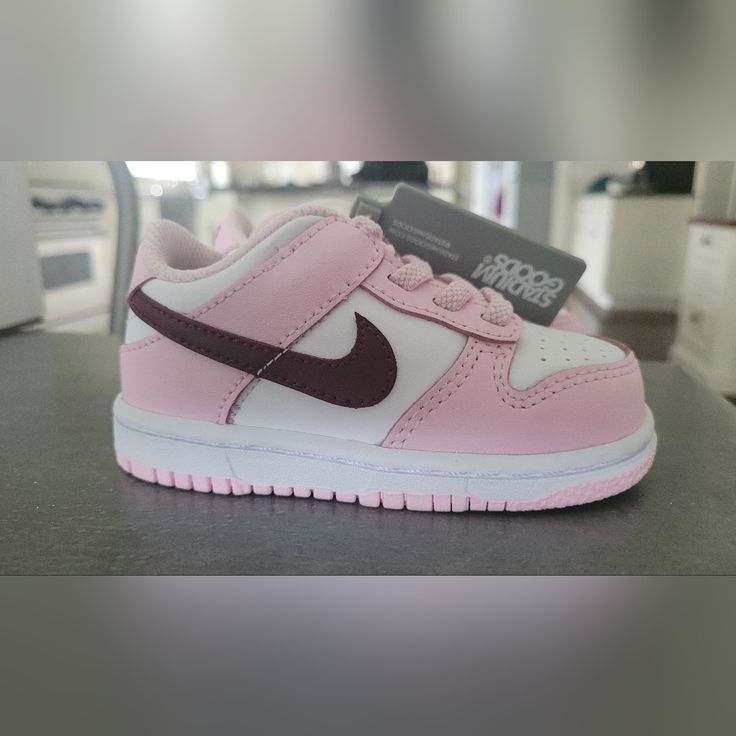 Nike Dunk Low Td 'Pink Foam' Is The Toddler Sizing Of The Retro Basketball Shoe In Gorgeous Pink And White With A Maroon Swoosh Logo On Both Sides. New With Tags. Stretch Opening For Easy On/Off. Hard To Find And Very Cute! Pink Low-top Custom Sneakers For Sports, Pink Skate Shoes With Rubber Sole And Round Toe, Cute Sports Sneakers With Round Toe, Pink Round Toe Skate Shoes For Streetwear, Cute Round Toe Sports Sneakers, Cute Pink Sneakers For Sports, Nike Canvas Shoes For Sports With Round Toe, Pink Nike Skate Shoes With Rubber Sole, Nike Pink Skate Shoes For Streetwear