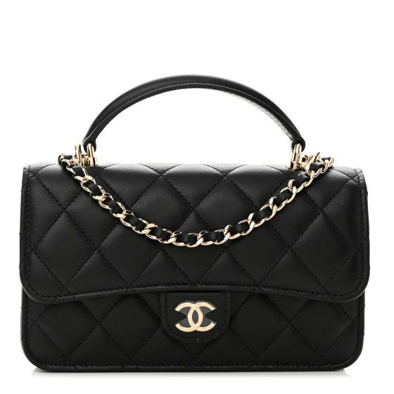 This is an authentic CHANEL Lambskin Quilted Flap Phone Holder With Chain in Black. This chic mini crossbody classic is crafted of quiltedlambskin leather in black. The bag features a leather top handle, a gold chain link leather-threaded shoulder strap and a facing gold Classic CC turn lock. This opens the flap to a matching leather interior with pockets. Mini Crossbody, Clothing Ideas, Leather Interior, Lambskin Leather, Leather Top, Phone Holder, Chain Link, Gold Chain, Top Handle