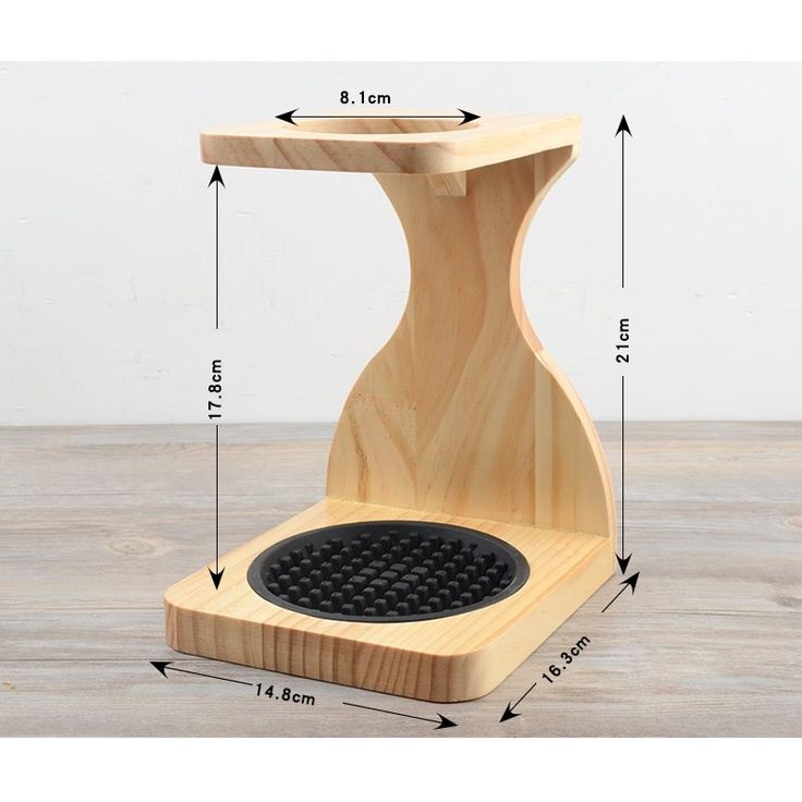 an image of a wooden stand with measurements for the top and bottom part on it