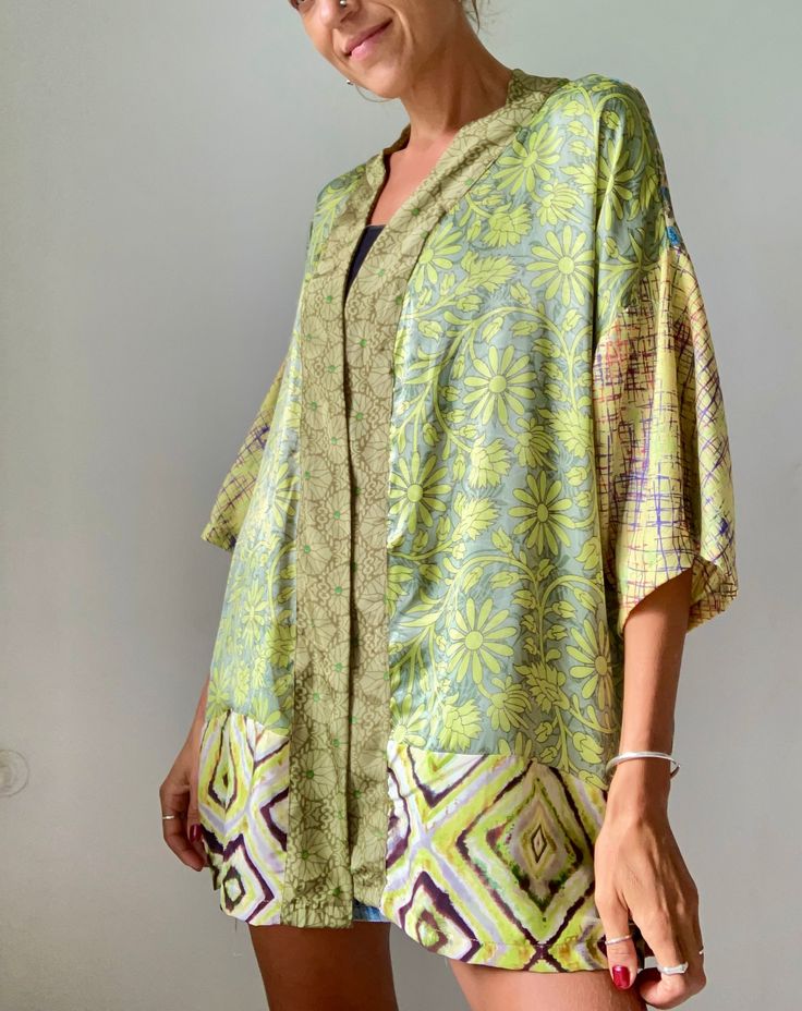 This is truly unique colorful shirt  one at the kind made patchwork, unisex hippie boho style shirt, super comfortable to wear relax fitting  with wide kimono sleeves, oversized style Feels soft and light light  made of upcycled indian silk  It is perfect outfit for all year round, looks good  with skirt as well as trousers or shorts, can be used as a beach cover up, in the summer time hippie boho style, great for summer festivals, travels and parties  free size, plus size more available at  htt Plus Size Festival, Summer Festivals, Hippie Shirt, Mode Boho, Festival Clothing, Kimono Sleeves, Oversized Style, Kimono Sleeve, Party Tops