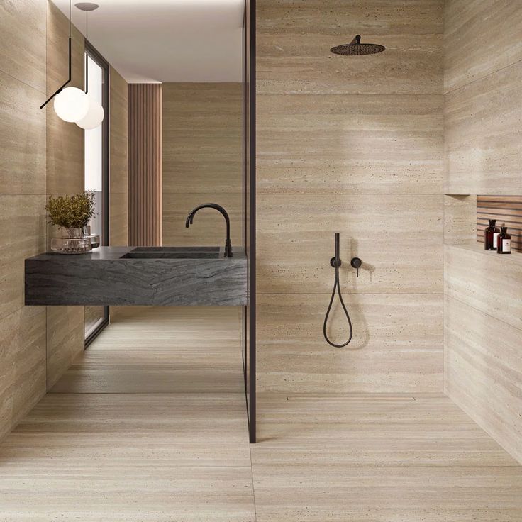 a modern bathroom with wooden walls and flooring