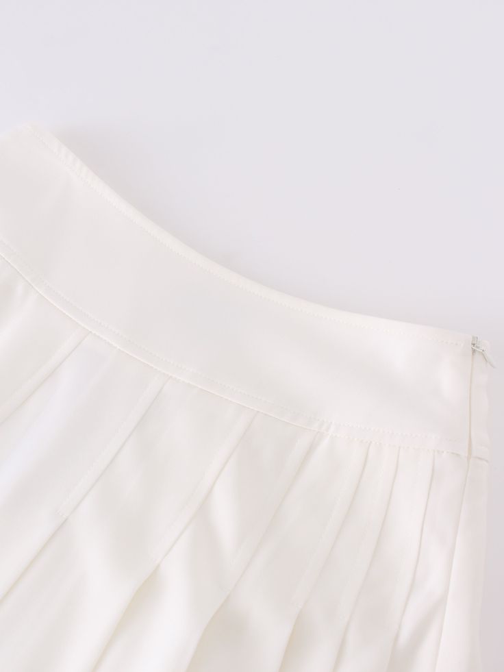 Experience effortless style with our Yolk Pleated Skirt in a classic white hue. The 37" length provides elegant coverage, while the pleated design adds texture to your look. Formal Mini Skirt For Summer, White Pleated Skirt For Party, White Pleated Skirt For Summer Party, Elegant Pleated Mini Skirt For Spring, Elegant Mini Pleated Skirt For Spring, White Pleated Skirt For Spring Party, White Mini Length Tennis Skirt For Party, Elegant Spring Pleated Mini Skirt, Elegant Mini Pleated Skirt For Summer