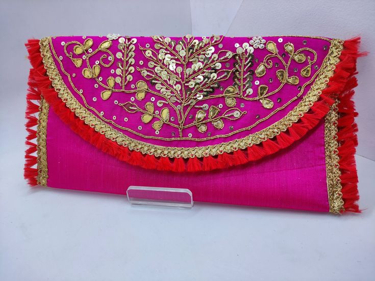 wedding favor handmade gota patti embroider assorted color gifting woman envelope wallet | traditional indian art deco embroider purse Handmade Reusable giveaways envelopes for wedding . Dimension: 13cm * 25cm The Wallet is designed to hold just the cards mobile phones and is the perfect size to hold when you're on the go. Our take on a classic card wallet features a textured print design and asymmetric front opening. We welcome wholesale queries. Gold Clutch With Gota Work For Gift, Traditional Gold Clutch With Mirror Work, Diwali Potli Bag With Mirror Work, Diwali Mirror Work Potli Bag, Festive Pink Clutch As Gift, Festive Pink Clutch For Gift, Pink Clutch For Festive Gift, Pink Festive Clutch For Gift, Festive Celebration Potli Bag With Mirror Work