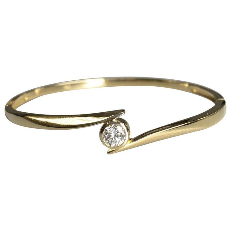 18k Yellow Gold Diamond Bypass Bangle Bracelet | From a unique collection of vintage Bangles at https://www.1stdibs.com/jewelry/bracelets/bangles/. Classic White Gold Bangle With Single Diamond, Oval Diamond Bracelet With 17 Jewels, 17 Jewels Bangle Diamond Bracelet For Anniversary, Classic Yellow Gold Bracelet With Single Diamond, Timeless Yellow Gold Bracelet With Single Diamond, Diamond Bangle For Anniversary, 14k Yellow Gold Diamond Bracelet With Single Diamond, Heirloom Diamond Bracelet With Accents For Formal Occasions, Anniversary Diamond Bracelet With Single Cut Diamonds