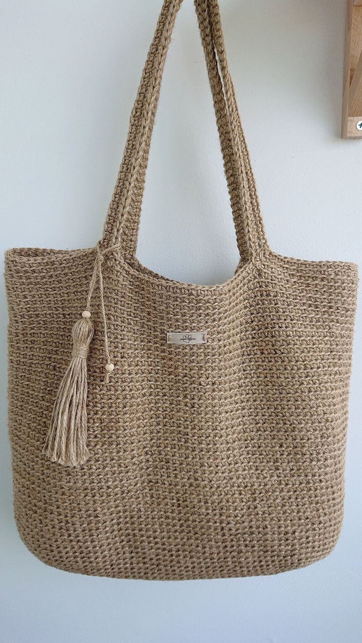 a jute bag hanging on the wall