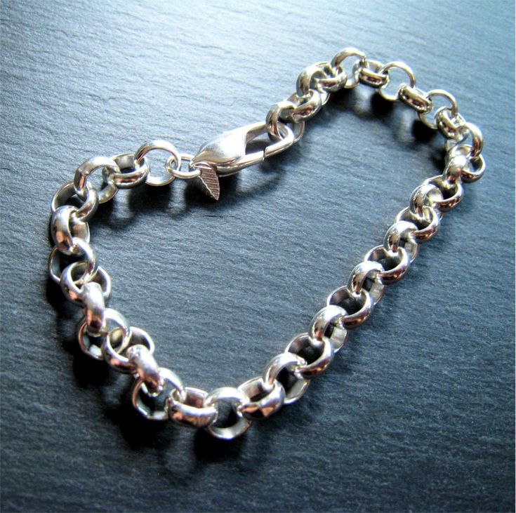 "Heavy silver bracelet. This lovely chunky silver plated chain bracelet can easily stand on it's own, due to the very good looking heavy gauge Rolo links. These heavy links will look good on a man or a woman.  Layer it up with other bracelets.  Use this as a base for a beautiful charm bracelet, not forgetting to add a little extra length to accommodate the charms.  I offer this bracelet in four different wrist sizes.  If you need another size just put the ACTUAL wrist size in the comment box for Silver Link Bracelets With Rolo Chain, Silver Charm Bracelet With Rolo Chain Links, Silver Charm Bracelet With Rolo Chain For Gift, Silver Chunky Chain Round Bracelet, Everyday Silver Charm Bracelet With Chunky Chain, Silver Chunky Chain Charm Bracelet, Silver Chunky Chain Bracelet As Gift, Silver Chunky Chain Bracelet For Gift, Silver Charm Bracelet With Chunky Chain