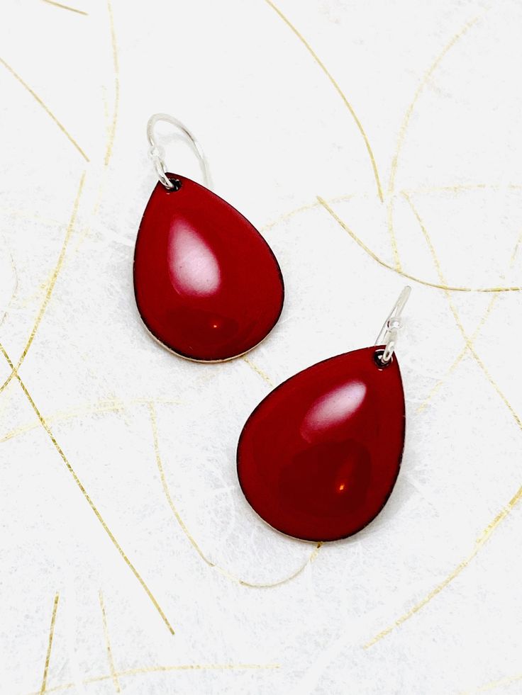 Red enamel earrings. A delicate drop of color. Enamel measures 3/4 inch long. Includes Sterling silver earwires. M Flame red enamel. Handle as glass. Handmade in Seattle, Wa 🐳 Interested in wholesale!?! Great! Email info@magpiemousestudios.com Red Drop Earrings For Pierced Ears, Red Drop Earrings For Gift, Handmade Red Teardrop Earrings, Red Handmade Drop Earrings, Red Teardrop Earrings For Gifts, Red Nickel-free Teardrop Dangle Earrings, Red Teardrop Drop Earrings, Red Teardrop Earrings As A Gift, Red Nickel-free Teardrop Earrings