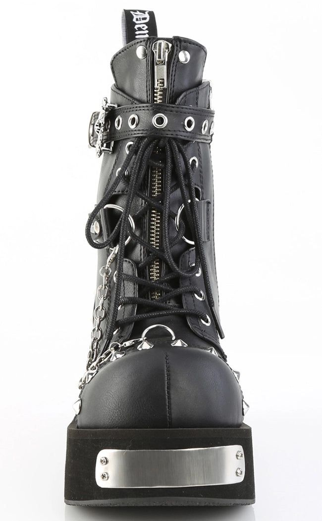 The Dank lace-up shoes are the chunkiest boys, featuring metal plates and a skull buckle, these are the dankest kicks to go in! Vegan Black PU leather 3 1/4 inch platform Front & Back Metal Plated Platform Lace-up Featuring Eyeletted Skull Head Buckle Strap, Metal Cone Studded Details on the Toe and Heel, Ornamental Zipper on Tongue, D-Ring & Hanging Chain Details U.S women's sizing-refer to size chart for more info Chunky Ankle Boots, Demonia Shoes, Metal Plates, Skull Head, Black Vegan, Perfect Shoes, D Ring, Leather Ankle Boots, Lace Up Shoes