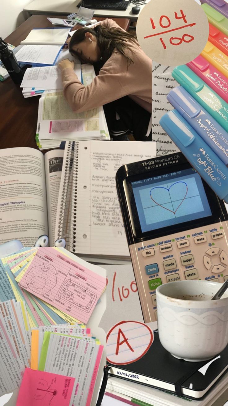 a woman sleeping on top of a pile of books next to a calculator