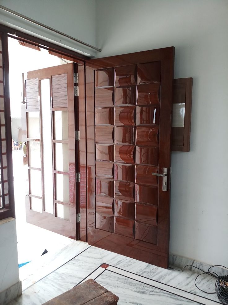 a room that is being remodeled with wooden doors