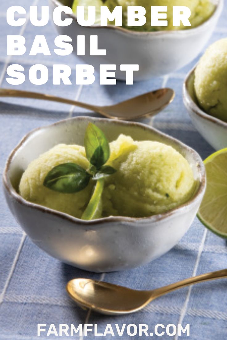 two bowls filled with green cucumber basil sorbet next to spoons