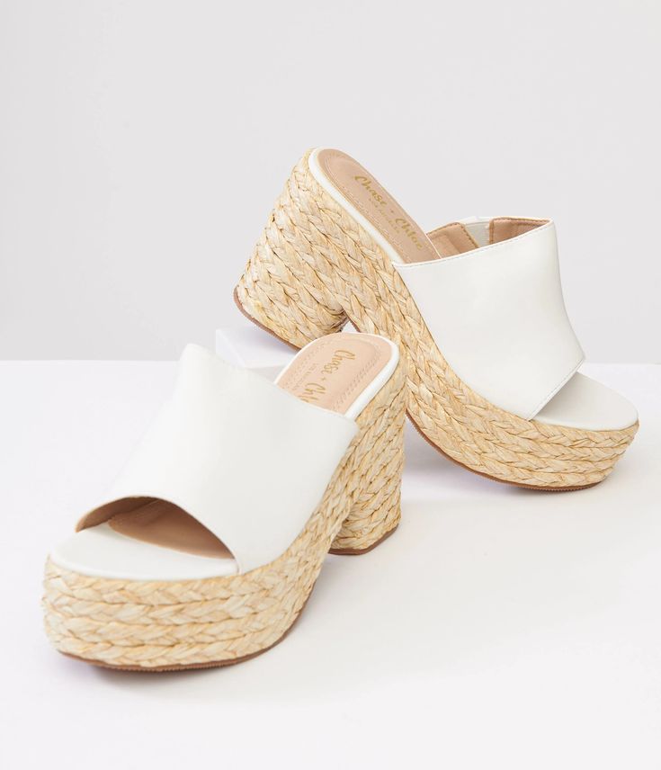 1970s White Platform Woven Sandals – Unique Vintage White Platform Slippers With Wedge Heel For Vacation, White Wedge Heel Platform Slippers For Vacation, Spring Slip-on Heels With Woven Sole, White Platform Slippers With Round Toe For Vacation, White Synthetic Wedge Heel Platform Slippers, White Slip-on Wedge Sandals For Summer, White Platform Sandals For Vacation, White Platform Sandals For Summer, Summer White Wedge Sandals With Removable Insole