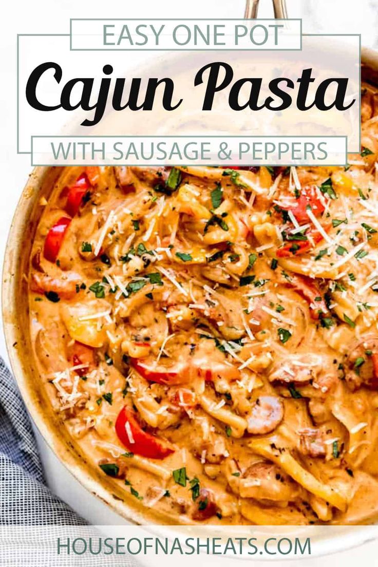 easy one pot cajun pasta with sausage and peppers in a white casserole dish