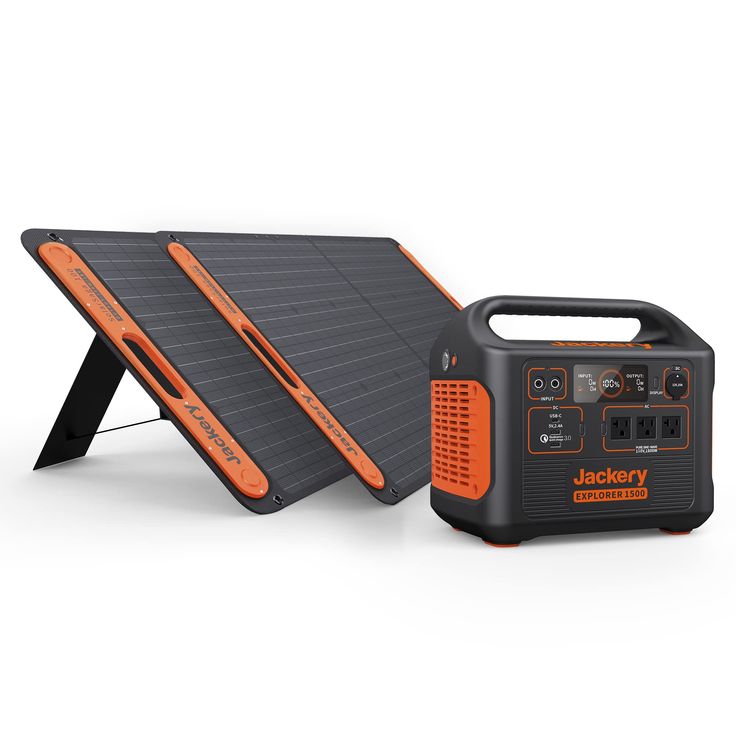 an orange and black portable solar panel with the charger on it's side