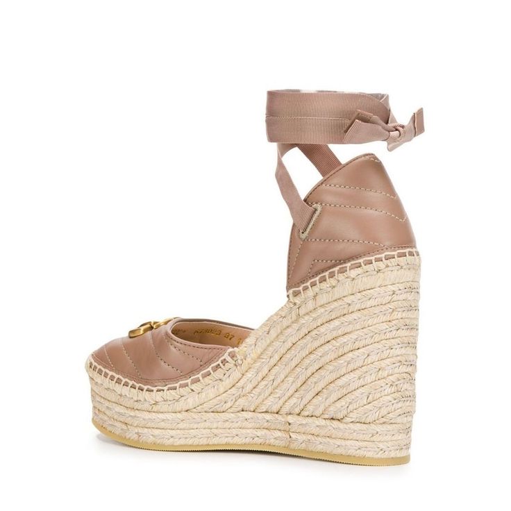 The Gucci collection is the pinnacle of Italian craftsmanship and attention to detail as seen in these dusty pink Leather platform espadrilles. Featuring an almond toe, a branded insole, a high wedge heel, a grosgrain lace-up closure and a gold-tone double G logo on the front.Lining: Leather 100%, Jute 100%Sole: Rubber 100%Outer: Leather 100% Gucci Leather Wedge Sandals For Summer, Chic Gucci Platform Wedge Sandals, Gucci Wedge Sandals With Platform Heel, Chic Gucci Summer Wedge Sandals, Gucci Platform Wedge Sandals, Chic High Heel Espadrilles With Woven Sole, Gucci Summer Wedge Heel Sandals, Gucci Summer Wedge Sandals, Gucci Open Toe Platform Wedge Sandals