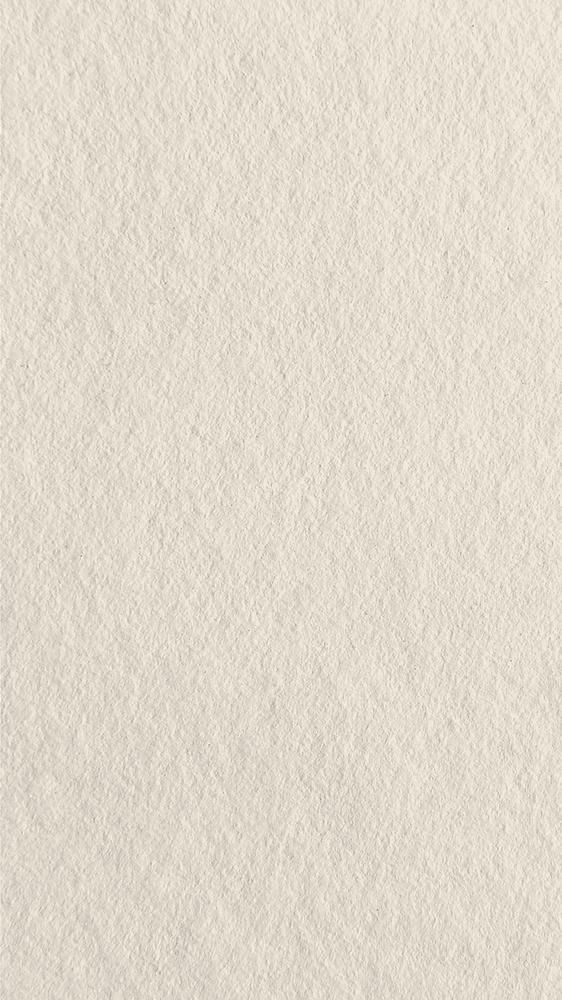 an image of a white wallpaper with small dots on the top and bottom half