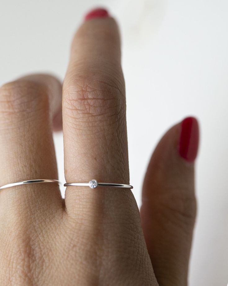 Small CZ Diamond Stacking Rings - It's a simple and classic everyday ring that adds a tiny sparkle to your finger :) Perfect as a stacking ring or by itself. This elegant Tiny CZ stone ring is made with 14K gold filled / sterling silver. ■ Pearl ring can be found here: https://www.etsy.com/listing/588155462/freshwater-pearl-ring-dainty-stacking?ref=shop_home_active_25 ■ SHIPPING UPGRADES You can find shipping upgrades options in the drop bar menu when you check out. * Within the U.S Regular Firs Minimalist Stackable Crystal Toe Ring, Dainty Everyday Ring With Tiny Details, Adjustable Solitaire Rings For Everyday, Dainty Round Band Rings For Everyday, Dainty Stackable Rings With Simple Design As Gift, Minimalist Adjustable Crystal Ring With Round Band, Silver Minimalist Diamond Ring, Everyday Tiny Midi Rings With Round Band, Minimalist Adjustable Solitaire Ring