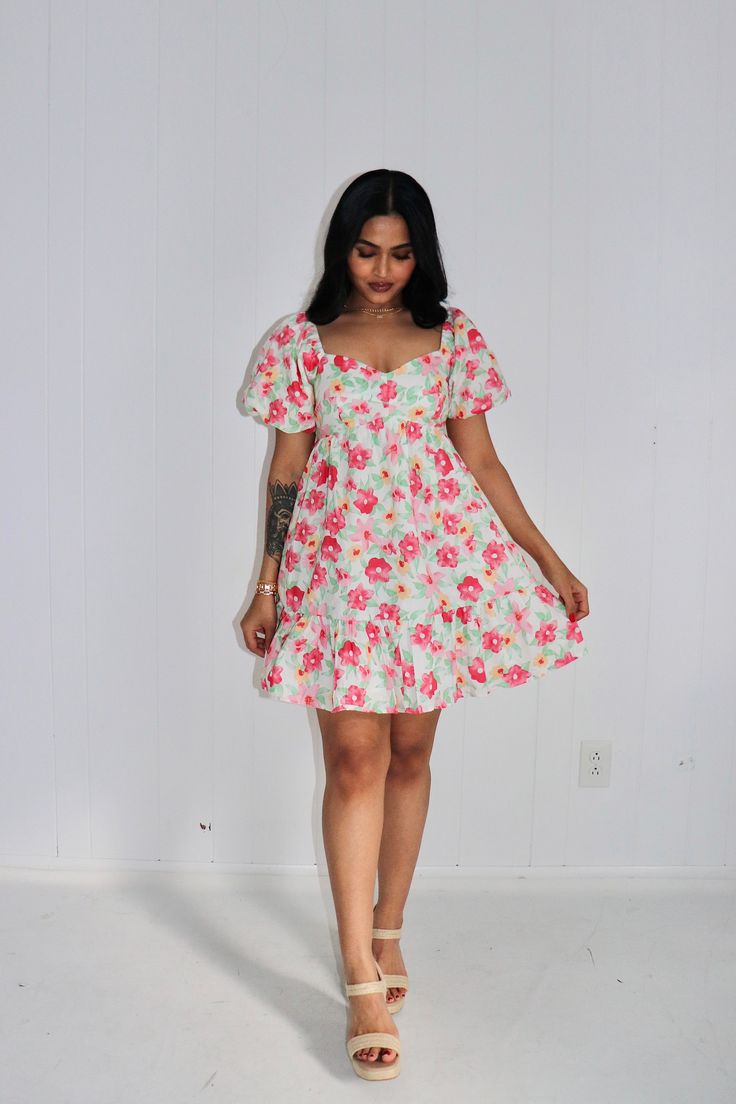 Floral puff sleeve babydoll mini dress Sweetheart neckline Short puff sleeves Ruffle hem Smocked elastic back Pockets Non-sheer Non-stretching Fit: True to size SIZE CHART (Measured in inches) Size Fits Like Length Bust Small 2/4 Medium 6 Large 8/10 Model Specs Arzoo is wearing a SMALL. Height: 5'4 Size: 2/4 Dress Sweetheart Neckline, Babydoll Mini Dress, Flat Sneakers, Sneaker Heels, Knitting Materials, Ruffle Hem, Sweetheart Neckline, Puff Sleeves, Stretching