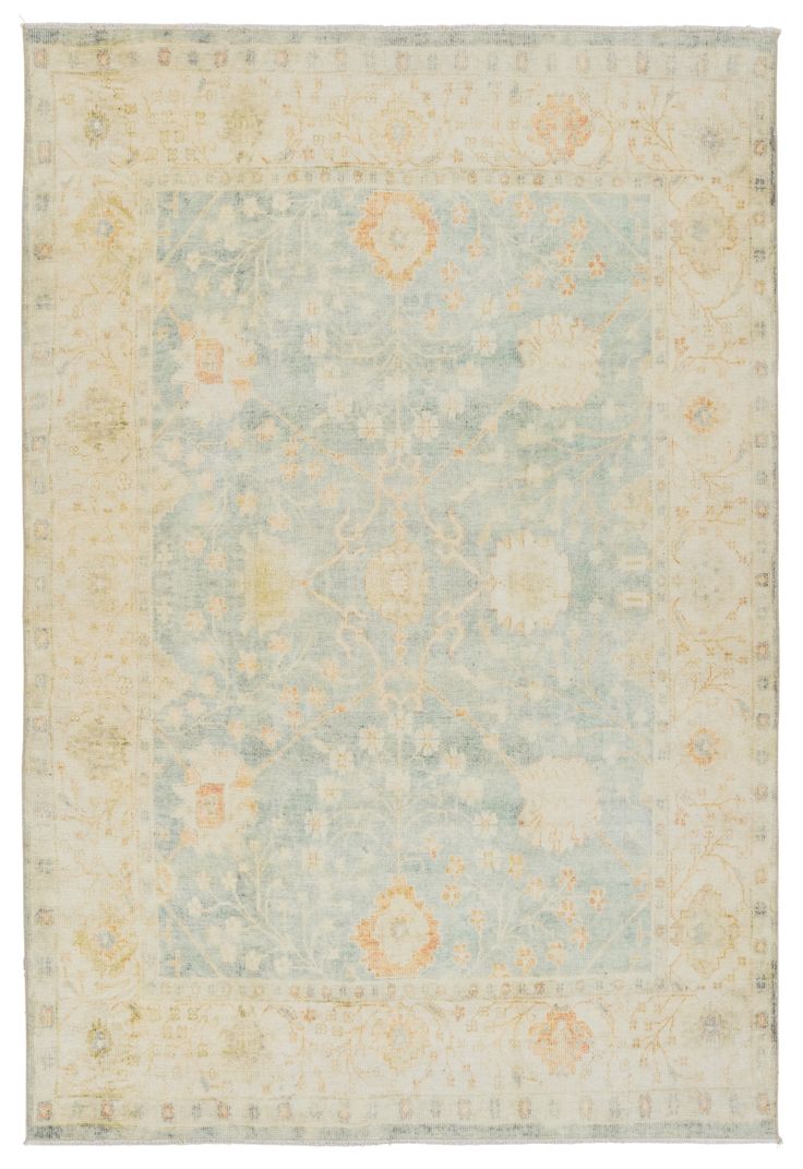 an antique rug with blue, yellow and orange colors on the bottom half of it