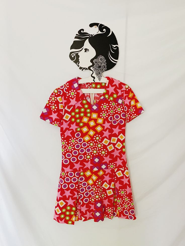 A fresh run of true vintage dresses are dropping this week. I will include brand, sizing, measurements, material, and any additional notes. Please refer to photos.  Brand: unknown Tagged size: unknown Material: cotton Pit to pit: 16" Shoulder: 14" Waist: 28.5" Hip: 31" Length: 31" Notes: short sleeve fit and flare style dress, likely handmade (no tags), beautiful vibrant confetti pattern, cotton material. Back metal zipper closure. *A little to snug for my mannequin so I don't have photos of her Vintage V-neck Mini Dress For Summer, Vintage Cotton V-neck Dress, Vintage Cotton Mini Dress For Summer, Retro A-line Dress With Vintage Print, Vintage Knee-length Mini Dress With Retro Print, Retro Short Sleeve Dress With Vintage Pattern, Retro A-line Vintage Dress With Vintage Print, Retro A-line Dress With Vintage Pattern, Vintage Floral Print V-neck Mini Dress