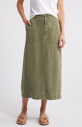 Rock utilitarian vibes in this any-day maxi skirt crafted from a lightweight linen-kissed blend. Zip fly with button closure 65% Tencel® lyocell, 22% cotton, 13% linen Tencel lyocell is a more-sustainably produced fiber made with closed-loop processing Machine wash, tumble dry Imported Long Linen Skirt Pattern, Spring Cotton Maxi Skirt With Pockets, Cotton Maxi Skirt With Pockets For Spring, Summer Wide Leg Maxi Skirt With Button Closure, Casual Long Cargo Skirt For Summer, Cotton Maxi Skirt With Side Pockets, Summer Full-length Maxi Skirt With Pockets, Spring Rayon Maxi Skirt, Green Maxi Skirt With Pockets For Spring