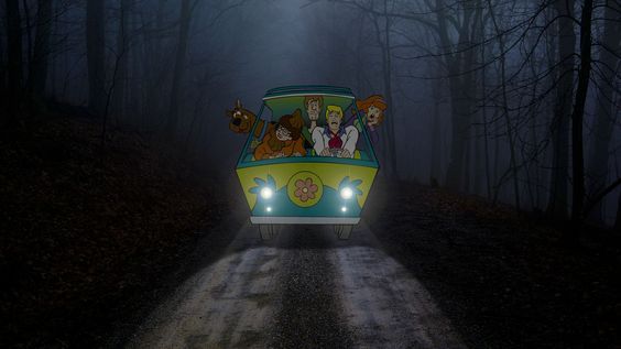 an animated car driving down a road in the dark with people on it's roof